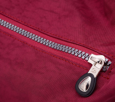 Large women's nylon tote bag with zipper, soft handles, and multiple color options.