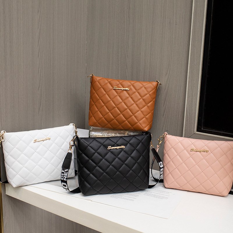 Small women's crossbody bag with diamond grid stitching and chain strap