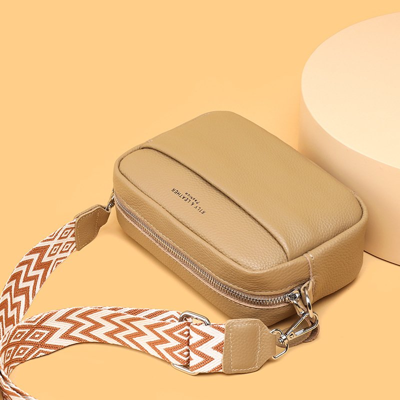 Small square crossbody bag with rhombus embroidery and wide shoulder strap